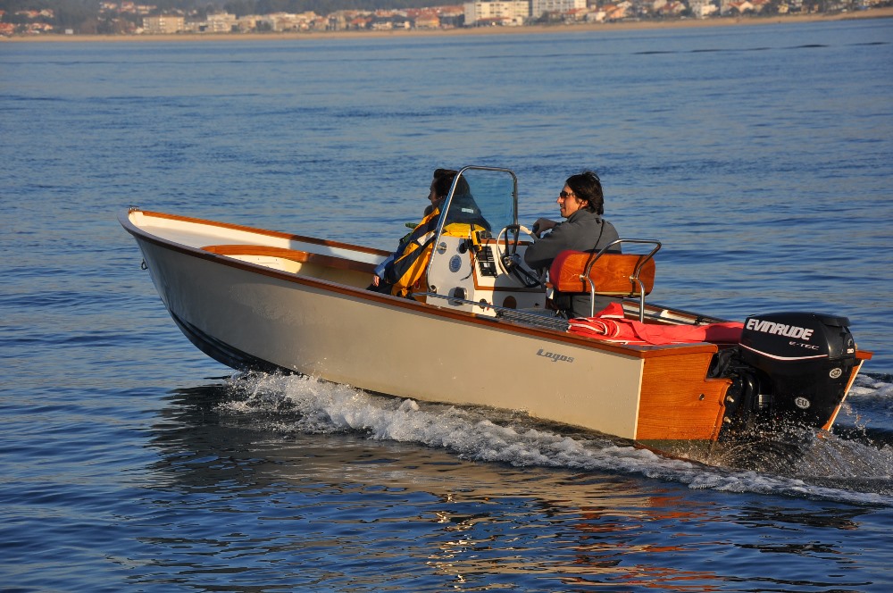 Trials of Lagos 5.5 wooden outboard
