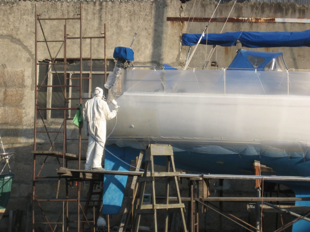 Painting topsides on a Sweeden 38 with Awlgrip
